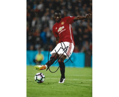 Eric Bailly signed Manchester United 12x8 colour photo. Eric Bertrand Bailly ( born 12 April 1994) is an Ivorian professional