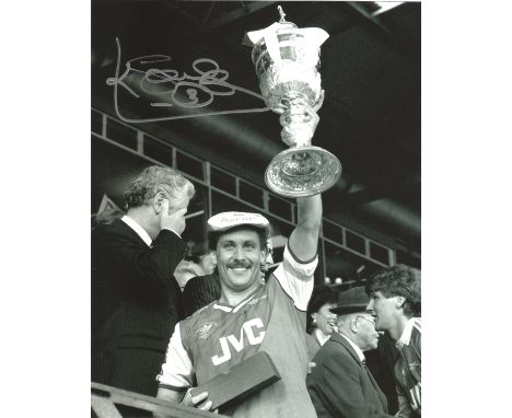 Football Kenny Sansom signed Arsenal 10x8 black and white photo. Kenneth Graham Sansom (born 26 September 1958) is a former p