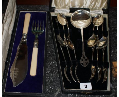 Set of EPNS dessert spoons and fork and fish servers in presentation boxes
