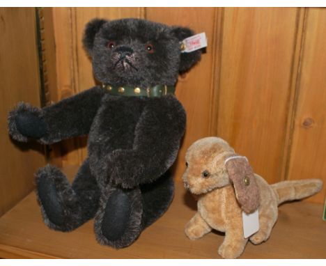 Modern Steiff black bear 27 cm high and a Steiff dog