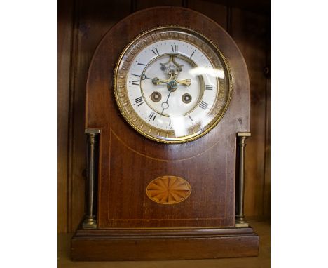 Edwardian striking mantle clock with brass pillars and marquetry decoration