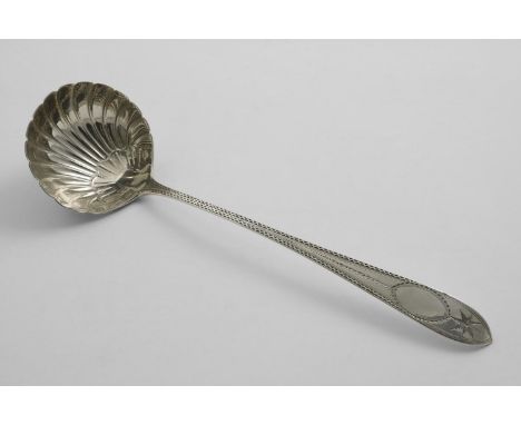 AN EDWARDIAN IRISH, BRIGHT-CUT AND STAR PATTERN SOUP LADLE with a fluted bowl, maker's mark "JS", Dublin 1901;  12.9"  (32.7 
