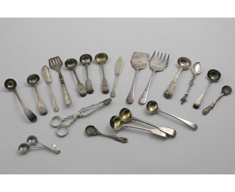 A MIXED LOT;- Fifteen various small spoons (mainly for condiments), a pair of late Victorian sugar nips, a pair of engraved s