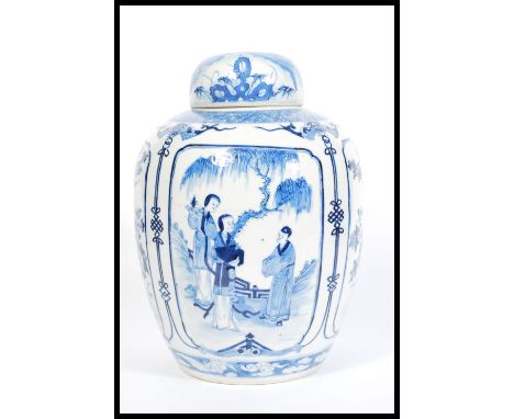 A large 19th century blue and white Chinese ginger jar with hand painted cartouche panels depicting scenes of Ladies , exotic