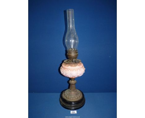 A Victorian oil Lamp having pink glass reservoir, no shade, 24 3/4" tall.