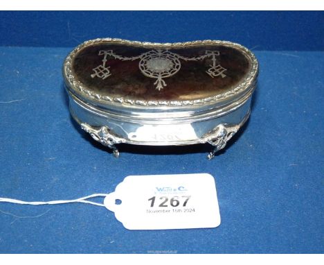 A Silver kidney shaped jewellery Box with tortoiseshell lid having silver inlay, London 1916 by Charles R Richard Comyns.