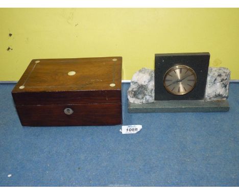 A vintage green and black marble Mercedes mantle Clock with columns of grey and white unpolished quartz, 8" long, plus a 19th