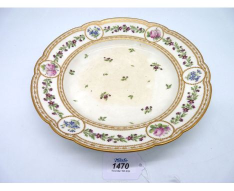 A large French porcelain de Monsieur Plate, late 18th century, painted with roses and other sprays of flowers, red mark to ba