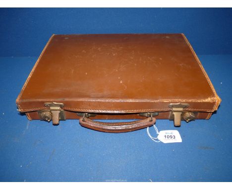 A vintage brown Leather slimline Briefcase, 15" x 11" x 2 1/2" deep.