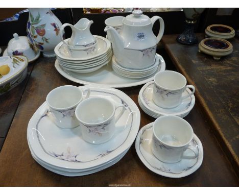A six place setting Royal Doulton "Nimbus" tea and dinner service. 