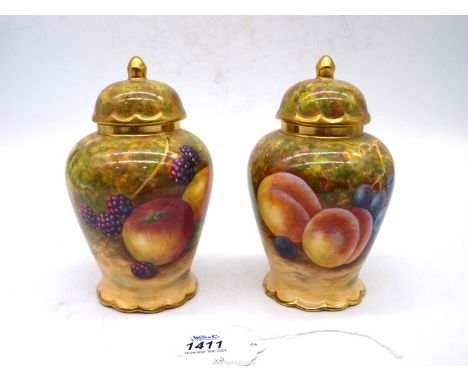 A pair of hand-painted Ginger Jars decorated with fruits, both signed F. Clark, ex-Royal Worcester artist, 6 1/2" high.