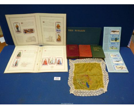 A small quantity of miscellaneous to include: National Provincial money boxes, Players 1937 cigarette card albums, a handkerc