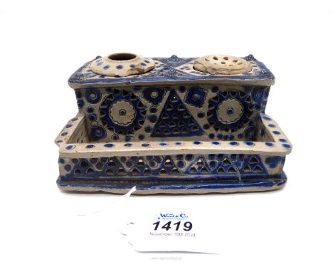 A German 18th century stoneware Inkwell with pierced and applied decoration and original ink pot and sander, 6" wide.