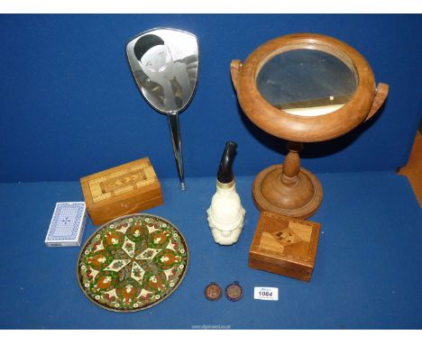 A brass and enamel champleve style plate, a ladies hand held Art Deco style chrome mirror and two enamel pendants relating to