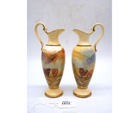 A pair of hand painted Ewers decorated with Highland cattle, both signed F. Clark, ex-Royal Worcester artist, 8 1/2" high.