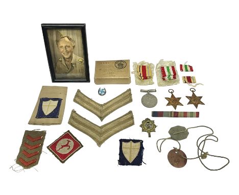 WWII group of three medals comprising 1939-45 War Medal and Italy and Africa Stars in issue box; dog tags for 282894 W. Wilki