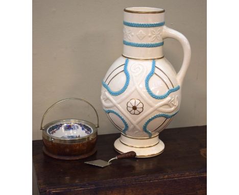 English pottery jug having relief decoration of serpents and turquoise rope decoration, the base with registration lozenge to