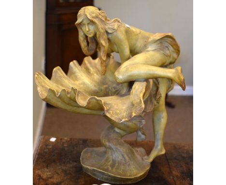 Goldscheider terracotta figural table centre depicting a Nymph atop a shell, impressed marks   Condition: 