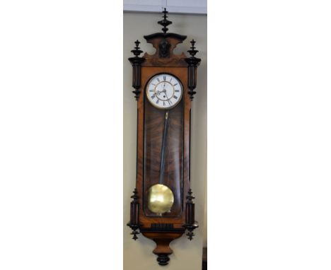 Late 19th/early 20th Century walnut and ebonised cased Vienna single weight wall clock, the white enamel dial with Roman nume