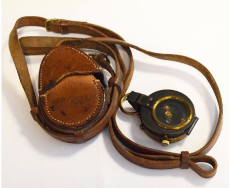 World War I compass by E. Koehn Of Geneva, No.58101, dated 1917 and with original stitched brown leather case   Condition: 