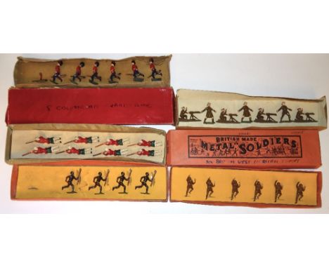 Johillco four Zulus, nine lying Highlanders, one man in khaki firing, one Scots Grey trumpeter, six Coldstream Guards running