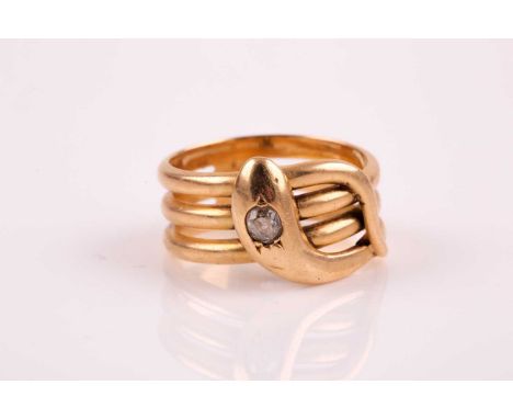 A yellow metal and diamond snake ring, possibly French, set with an old mine-cut diamond of approximately 0.15 carats, unmark