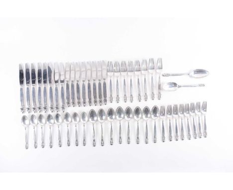 A 20th century, Georg Jensen sterling silver "Acorn Pattern" silver suite of table flatware for eight places. Mark To include