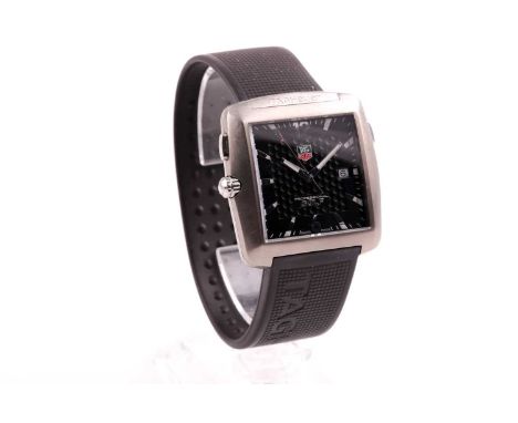 A Tag Heuer Golf wristwatch, Tiger Woods Edition, quartz movement, the square engine turned dial with baton indices and date 