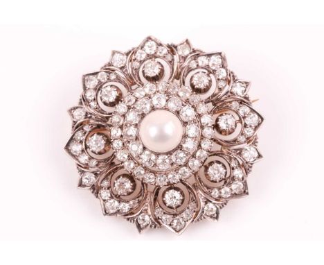 A late 19th / early 20th century diamond and pearl brooch, centred with a round white pearl, within a double border of old ro