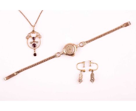 An Edwardian circular garnet and pearl negligee pendant to a cable link chain; a lady's 9ct gold watch with curb pattern brac