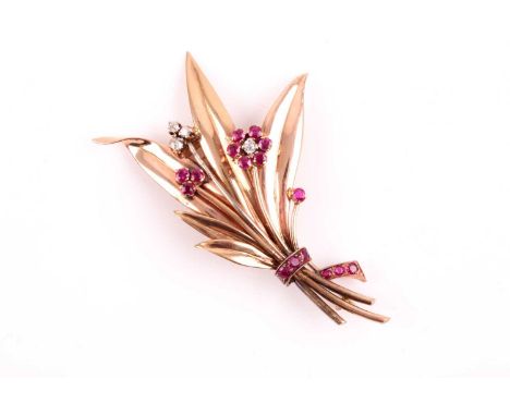 A 1940s/50s yellow gold, diamond, and ruby floral spray brooch set with round-cut rubies and round-cut diamonds, unmarked (te