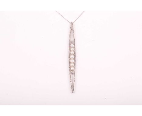 An unusual converted Edwardian diamond and pearl pendant, the elongated openwork mount centred with a row of seven white pear