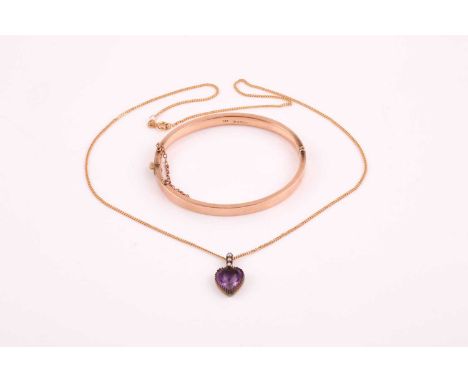 A late 19th / early 20th century yellow metal, amethyst, and pearl pendant, 11 cm long, suspended on a later 9ct yellow gold 