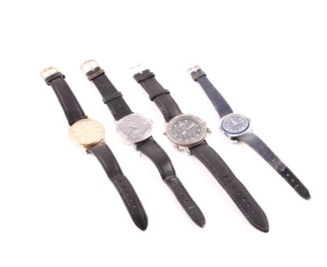 A group of four wristwatches, comprising an Omega DeVille quartz watch, 33.5 mm case; a Movado Kingmatic Esquire stainless st