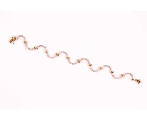 A diamond bracelet, the opposing curved panels set with single cut diamonds and hinged bar links; to a push-button clasp mark