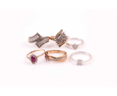 A 9ct white gold and diamond cluster ring, the nine princess cut diamonds in a square cluster within corner claw mounts, diam