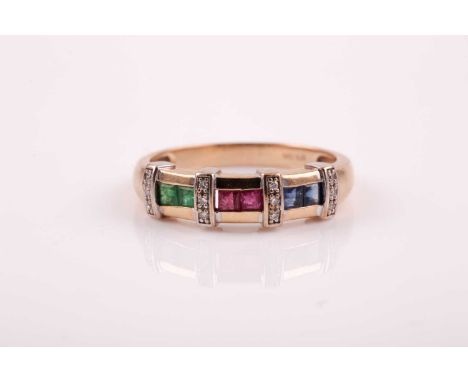 A 9ct yellow gold, sapphire, ruby, and emerald ring, the band set with square calibre-set stones interspersed with bars set w