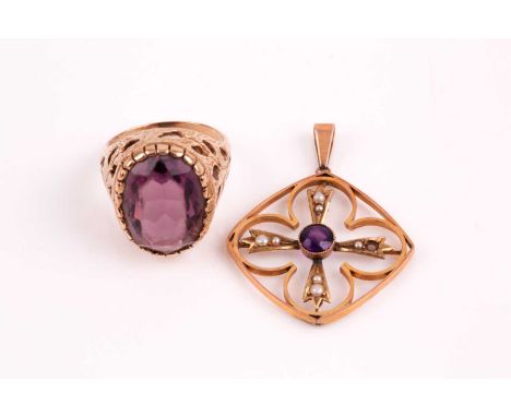 An Edwardian amethyst and split pearl pendant, the cruciform centre with collet set amethyst within a squared rose gold frame