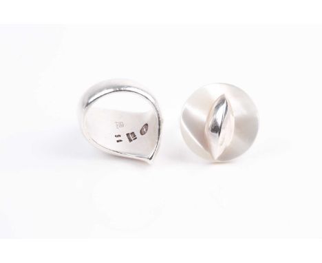 A Georg Jensen silver ring, in the Modernist style, of smoothly curved design, size M, together with a silver and mother-of-p