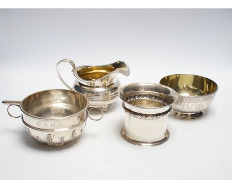 Two silver sugar bowls, London, 1877 and London, 1904, the latter with ring handles, diameter 10.8cm, a silver small vase and