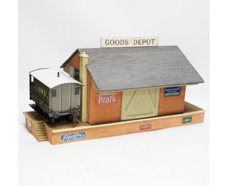 Eight items of Gauge One and 0 gauge model railway including; a Bassett-Lowke guard’s van, a cattle wagon, a gantry signal fo