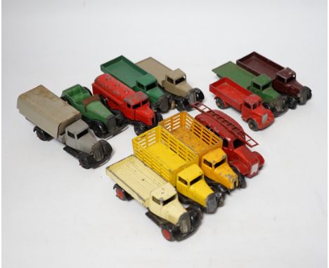 Twenty-five Dinky Toys and Atlas Dinky including a few pre-war examples; Delivery lorries, Market Gardener’s wagon, a Streaml