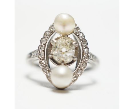A white metal single stone diamond and two stone cultured pearl set oval ring, with diamond chip set borders and shoulders, s