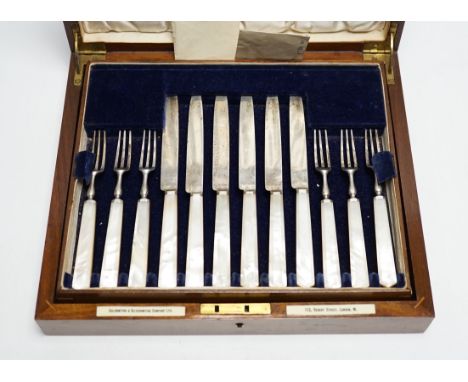 A cased set of twelve pairs of George V mother of pearl handled silver dessert eaters, Goldsmiths &amp; Silversmiths Co Ltd, 