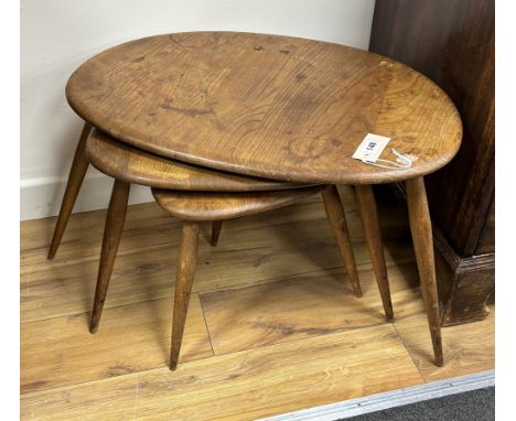A nest of three Ercol light elm tea tables, width 65cm, depth 43cm, height 38cm