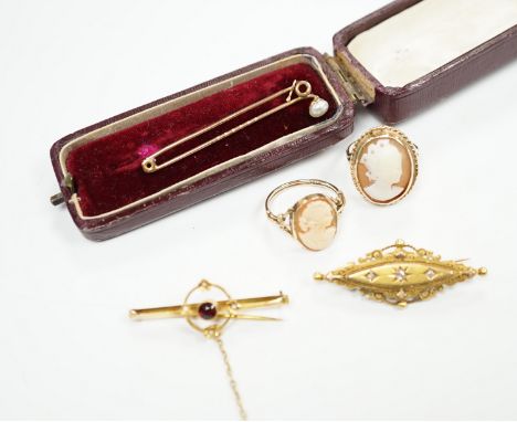 A late Victorian 15ct gold and three stone diamond chip set brooch, 43mm, an early 20th century yellow metal, garnet and seed