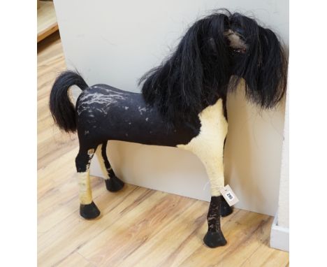 A wood and skin-covered model pony, height 75cm