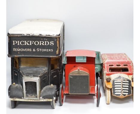 Three model vehicles including; a tinplate Tri-ang tipper lorry, a Pickfords removal van (believed to have been used as a sho