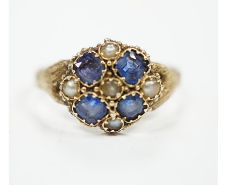 A Victorian 12ct gold sapphire and seed pearl cluster set ring, size M, gross weight 1.6 grams.