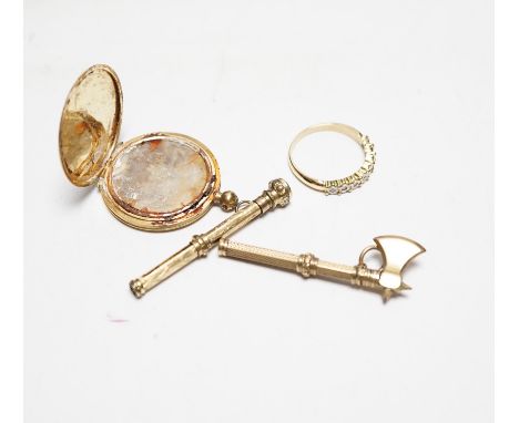 A yellow metal (stamped 18) locket (a.f.), a yellow metal and illusion set diamond chip half eternity ring and two other item